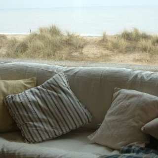 Available for hire - a static caravan on the beach